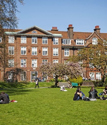 Students sitting on grass