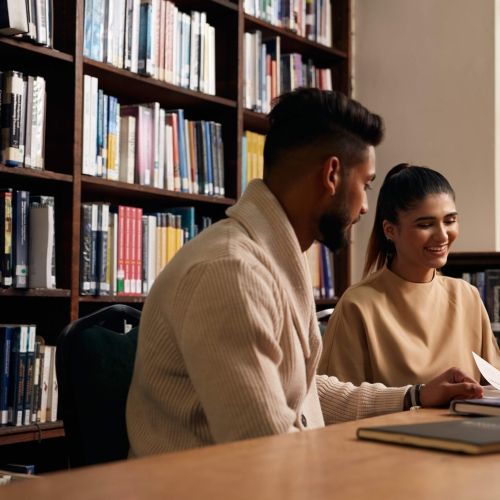 Students studying in library